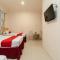RedDoorz At Fella Homestay Medan - Медан