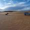 Erg Lihoudi Luxury desert camp with Camel ride, meals & sandboarding