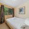 Whispering Trees by Discover Stradbroke