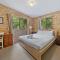 Whispering Trees by Discover Stradbroke