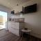 Les pommiers Duplex cosy tout confort mitoyen dune maison neuve avec terrasse entrée indépendante parking 5 mn de Bayeux et 10 mn plage du débarquement