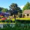 Le Vieux Moulin Gites - A charming stone cottage with garden view and seasonal pool - Guégon
