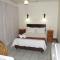 Dieu Donnee River Lodge - بورت شيبستون