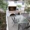 Iria's Cosy House, BBQ, garden, indoor fireplace - Sparta