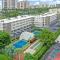 Breezy condo with deluxe pool and private beach access
