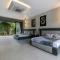Colossus by StayVista - Riverside luxury villa in Khalapur with a Spacious pool, Sauna, Private theater, Gazebo & Lawn