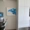 Modern stylish apt. steps away from the beach