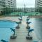 Studio with swimming pool access from the patio at Palazio Mount Austin IKEA AEON by GDRAGON HomeStay - Johor Bahru