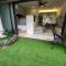 Studio with swimming pool access from the patio at Palazio Mount Austin IKEA AEON by GDRAGON HomeStay - Johor Bahru