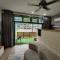 Studio with swimming pool access from the patio at Palazio Mount Austin IKEA AEON by GDRAGON HomeStay - Johor Bahru