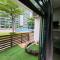 Studio with swimming pool access from the patio at Palazio Mount Austin IKEA AEON by GDRAGON HomeStay - Johor Bahru