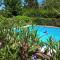 Cabaña monoambiente con pileta y jardín arbolado - Villa Elisa