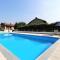 Attractive holiday home in Brozolo with private pool