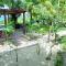 Casa Agua Bacalar / Naajil Ha