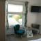 Contemporary one bed studio. Sea views and parking
