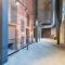 Brewery District 2-Story 2BR Apt Near Fiserv with Rooftop, Gym, and Parking