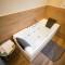 Belajo Central Apartment And Jacuzzi !!