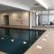 Studio cosy avec piscine couverte, fitness, près des pistes - 2 adultes et 1 enfant (-10 ans) - FR-1-404-261