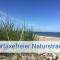 Böltser Hus Ferienwohnungen mit Strandkorb und Kamin 10 Gehminuten zum kurtaxefreien Sandstrand - Neukirchen
