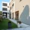 Arcobaleno Apartments & Rooms
