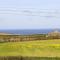 Stunning home, sea views, walk to beach