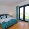 Stunning home, sea views, walk to beach