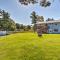 Lakefront Ludington Retreat with Kayaks and Fire Pit!