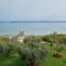 Appartamento ORCHIDEA a Sirmione sul Lago di Garda con piscina, giardino e spiaggia con molo