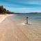 Beautiful beachside apartment w/ terrace, balcony.