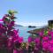 Holiday home Punta D’Oro with garden, parking place and private lake access at 300 m