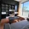 Modern 2BR Condo Near SM with Free Parking Pool WIFI and Netflix