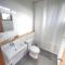 Hermosa cabaña 3, con tres dormitorios y un baño.