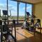 SnugglePod Condotel - Grand Riviera Suites