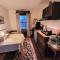 Upstairs Historic 1 Bedroom 1 Bath Suite with Mini-Kitchen, Porch & River Views