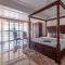 StayVista's Lake La Vie - Tranquil Lake-View Villa Amidst Farmland with Pool and Poolside Gazebo - Proximity to Sula - Насик