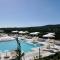 Resort con piscina a soli 250 mt dalla spiaggia La Pelosa