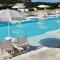 Resort con piscina a soli 250 mt dalla spiaggia La Pelosa
