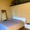 Room in BB - Sottotono Agriturismo with swimming pool on Florence surrounded by greenery