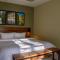 The Point by Roomy, Thandiani