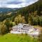 der Sonnberg Alpinlodges - Apartments mit Seeblick, privater Sauna und Self Check-In - Zell am See