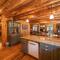Luxe Log cabin with hot tub/spa/steam room!