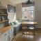Upstairs river apartment