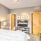 Downtown Condo with Rooftop Patio and City Views!