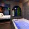 Minamina, chambre avec jacuzzi privatif