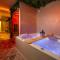 Minamina, chambre avec jacuzzi privatif