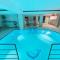 Luxury Seaside Villa with a classic Mediterranean Olive Garden, a fully equipped Professional Kitchen, Pool, Sauna, Padle Boards and Canoe - Miolin Beach House