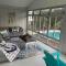 Stylish Lake home with HEATED POOL, Arcade with PS5,and Theater Just 5 min from Legoland - 温特黑文
