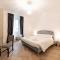 The Best Rent - Elegant five-bedrooms apartment near Colosseo