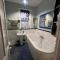 Big fireplace aga hot tub wet room barn garage