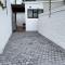 Centrally located modern 2-bedroom home & parking